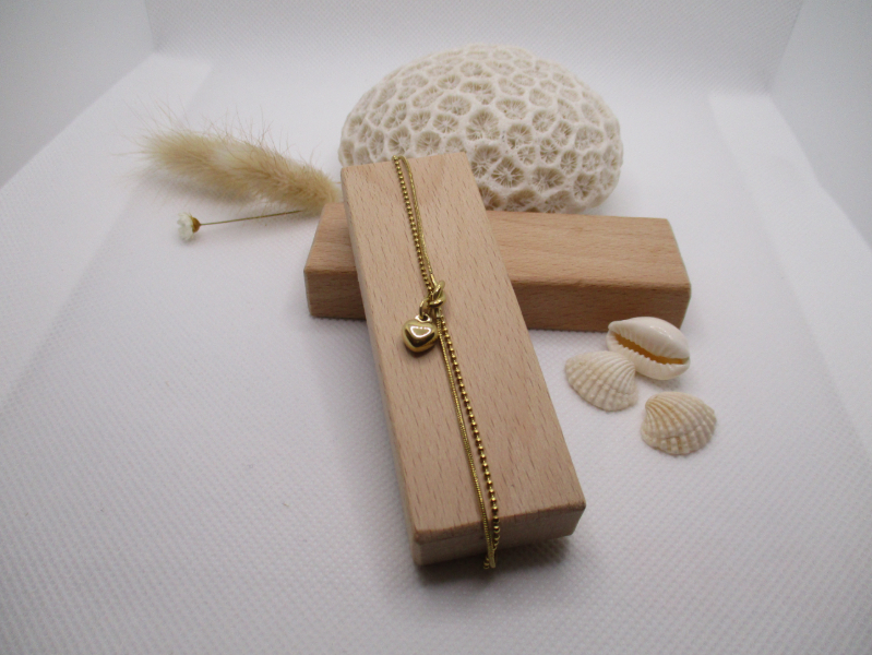 Bracelet nœud et cœur en acier doré